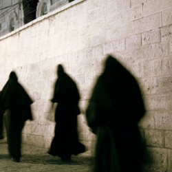 Nuns passing on the Via Dolorosa in Jerusalem Old City